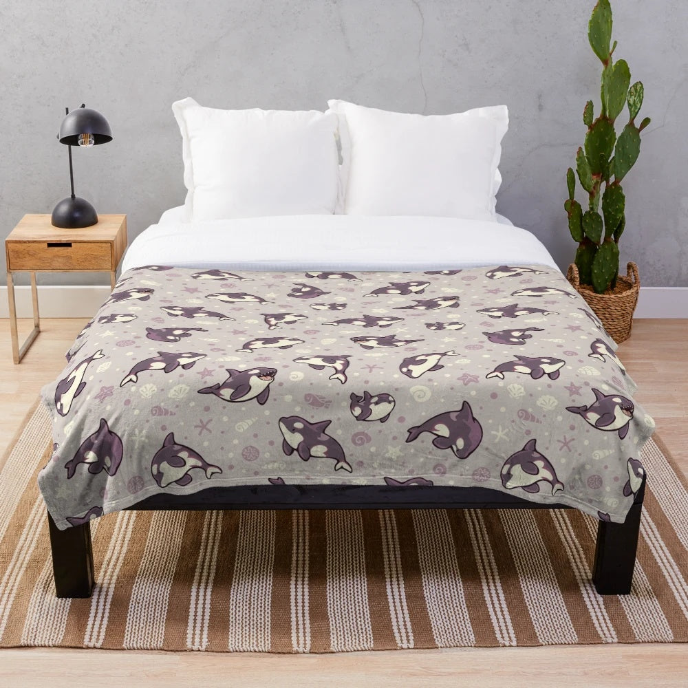 Jelly bean orca plush blanket with a cute whale pattern design