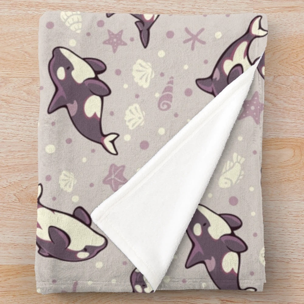 Jelly bean orca plush blanket with a cute whale pattern design