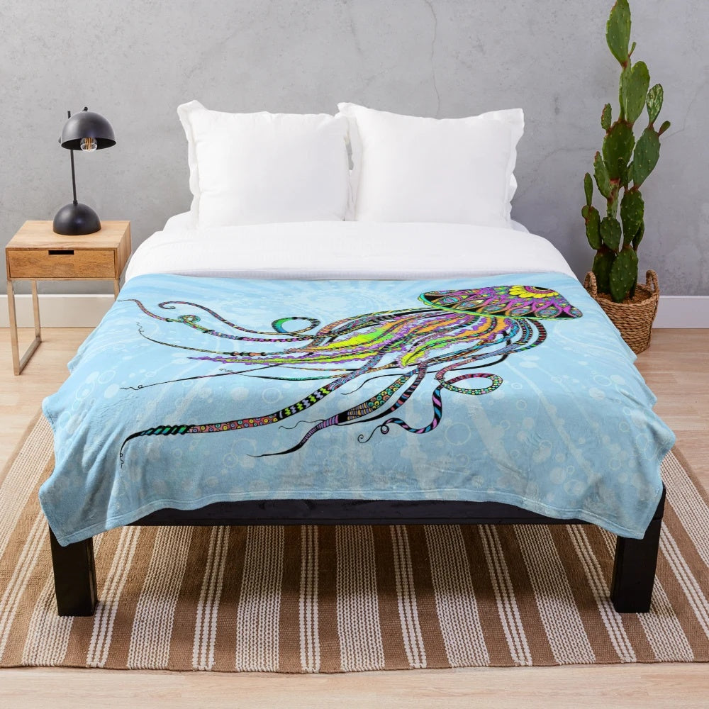 Colorful electric jellyfish plush blanket with a psychedelic, ocean-inspired design