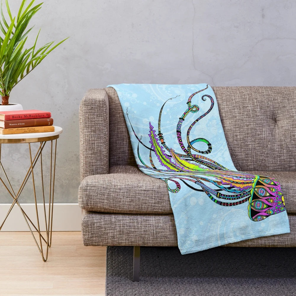 Colorful electric jellyfish plush blanket with a psychedelic, ocean-inspired design