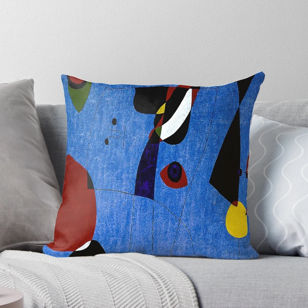 Colorful abstract art painting pillow featuring the iconic style of renowned artist Joan Miró