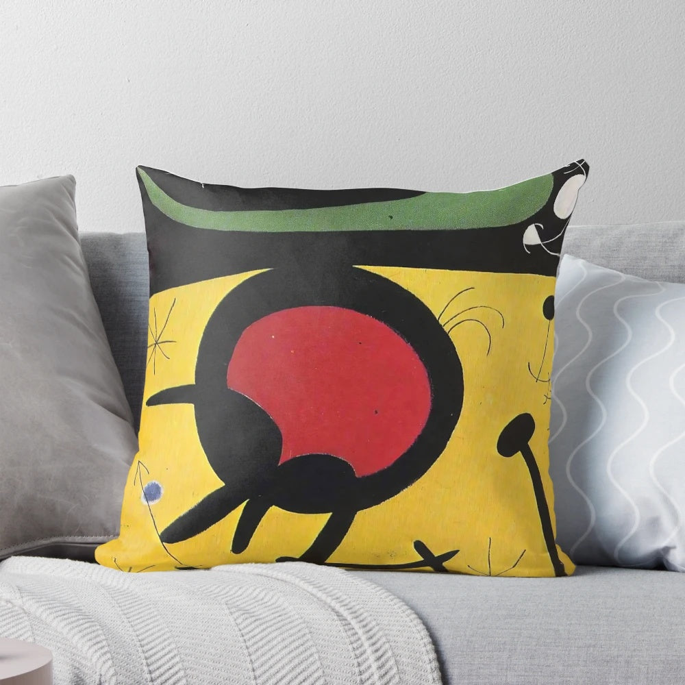 Colorful abstract throw pillow inspired by the paintings of Spanish artist Joan Miro