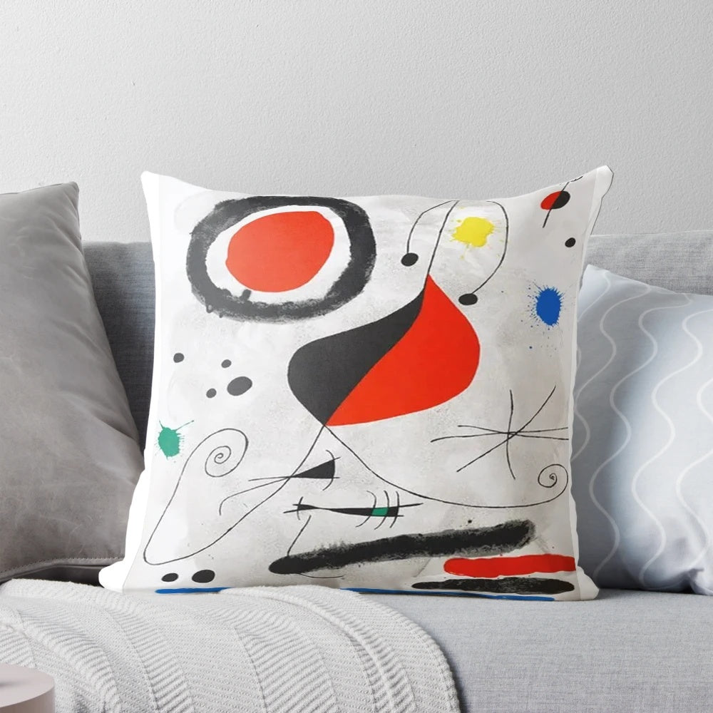 Colorful Joan Miro lithograph print decorative pillow featuring the iconic Spanish artist's abstract surrealist style.