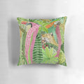 Lush jungle-inspired pillow with botanical leaves, flowers, and animal prints