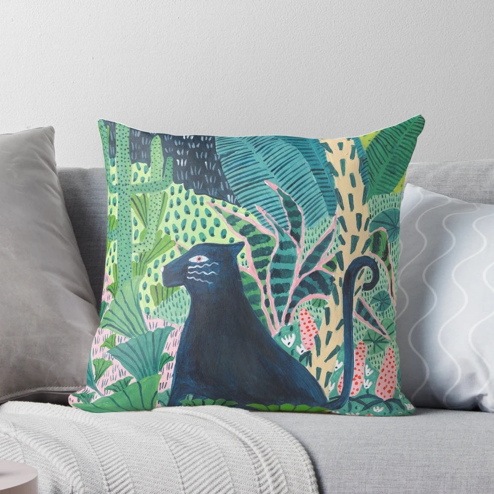 Decorative pillow featuring a lush, botanical jungle design with a jaguar or panther-like cat