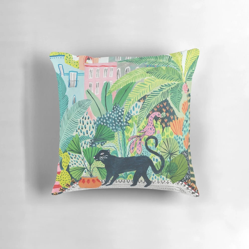 Lush jungle-inspired pillow featuring a panther or leopard animal print design