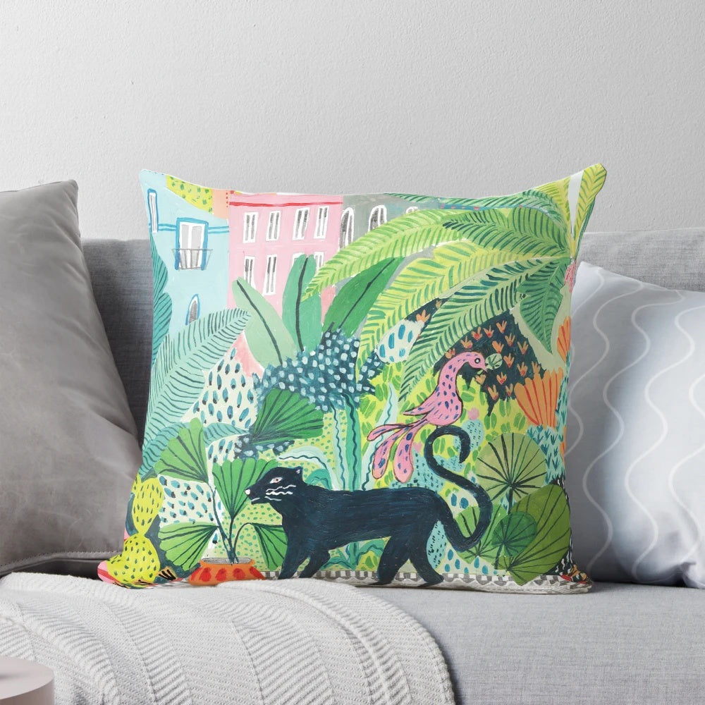 Lush jungle-inspired pillow featuring a panther or leopard animal print design