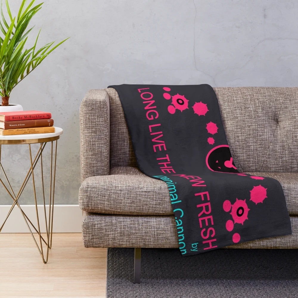 Just Shapes and Beats-themed plush blanket featuring vibrant colors and gaming elements