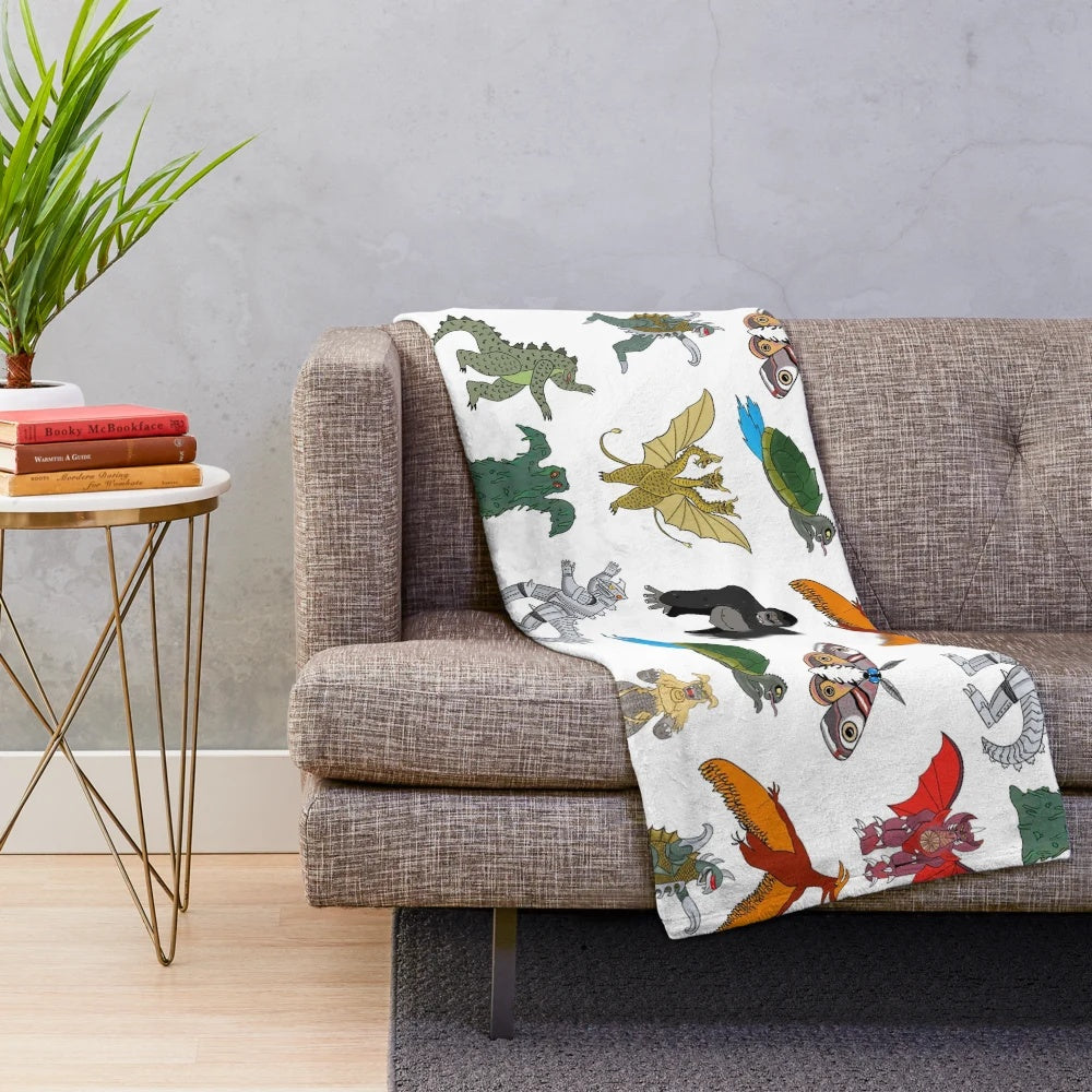 Colorful kaiju-themed plush blanket