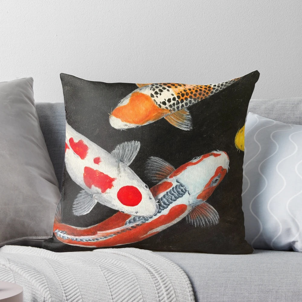 Decorative pillow featuring a vibrant painting of colorful koi fish swimming in a pond