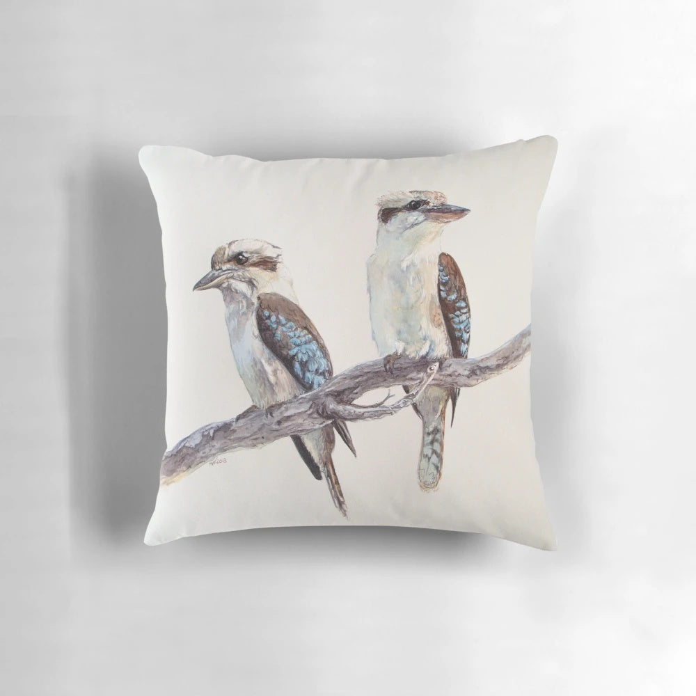 Colorful watercolor painting of a kookaburra, an iconic Australian bird, on a decorative pillow.