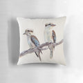 Colorful watercolor painting of a kookaburra, an iconic Australian bird, on a decorative pillow.