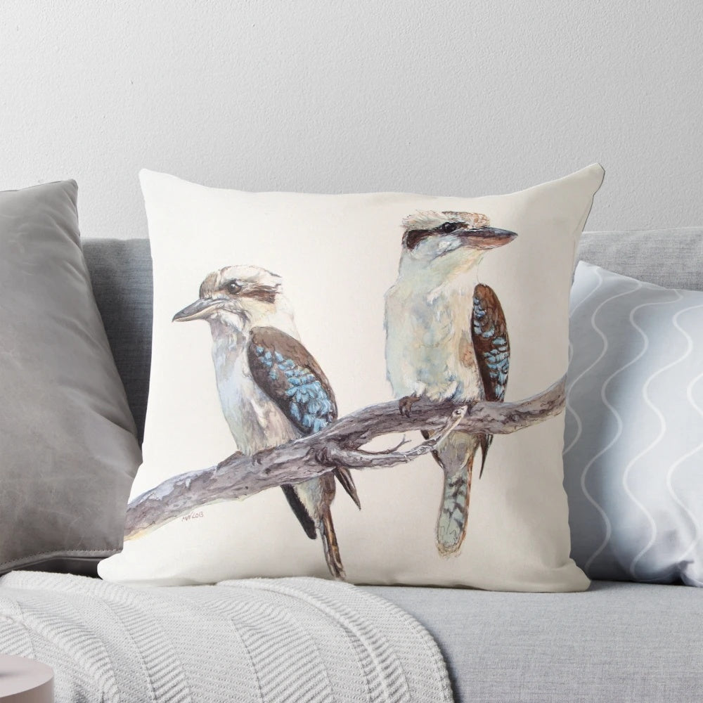Colorful watercolor painting of a kookaburra, an iconic Australian bird, on a decorative pillow.