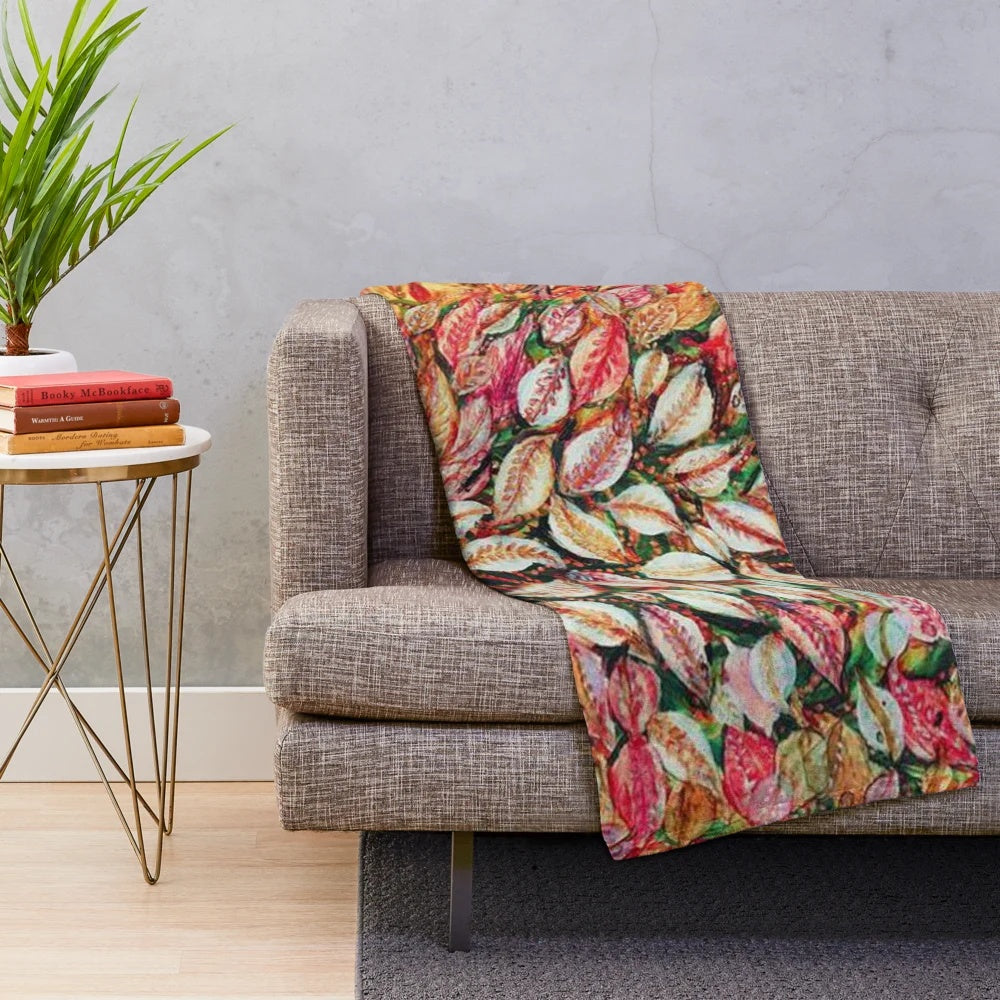 Plush blanket featuring vibrant leaves pattern inspired by Seraphine Louis' artwork