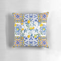 Colorful mosaic pattern pillow featuring lemons, flowers, and a Mediterranean-inspired design.