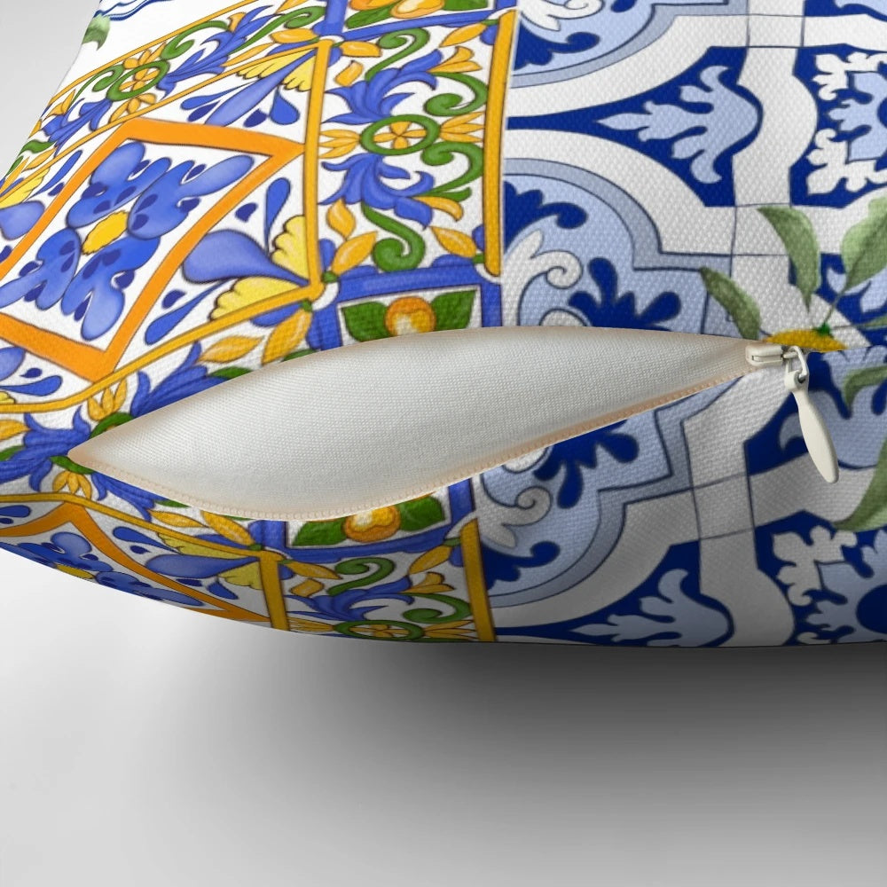 Colorful mosaic pattern pillow featuring lemons, flowers, and a Mediterranean-inspired design.