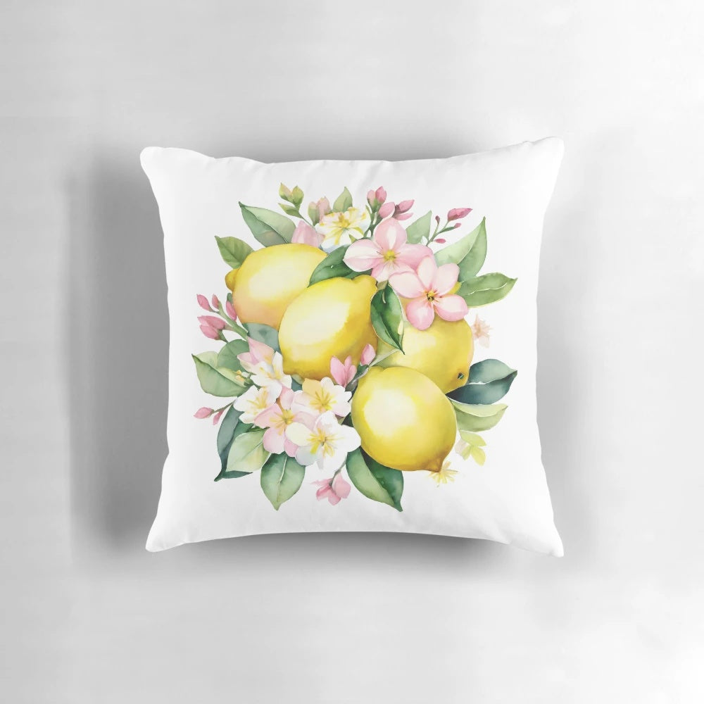 Decorative throw pillow featuring a watercolor illustration of lemons and sunny flowers in a bouquet against a light background