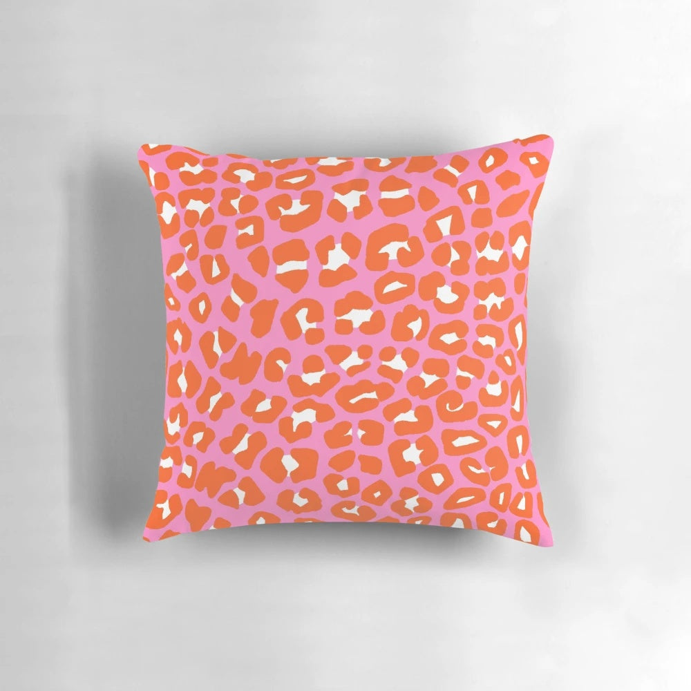 Plush pink and orange leopard print pattern pillow for home decor