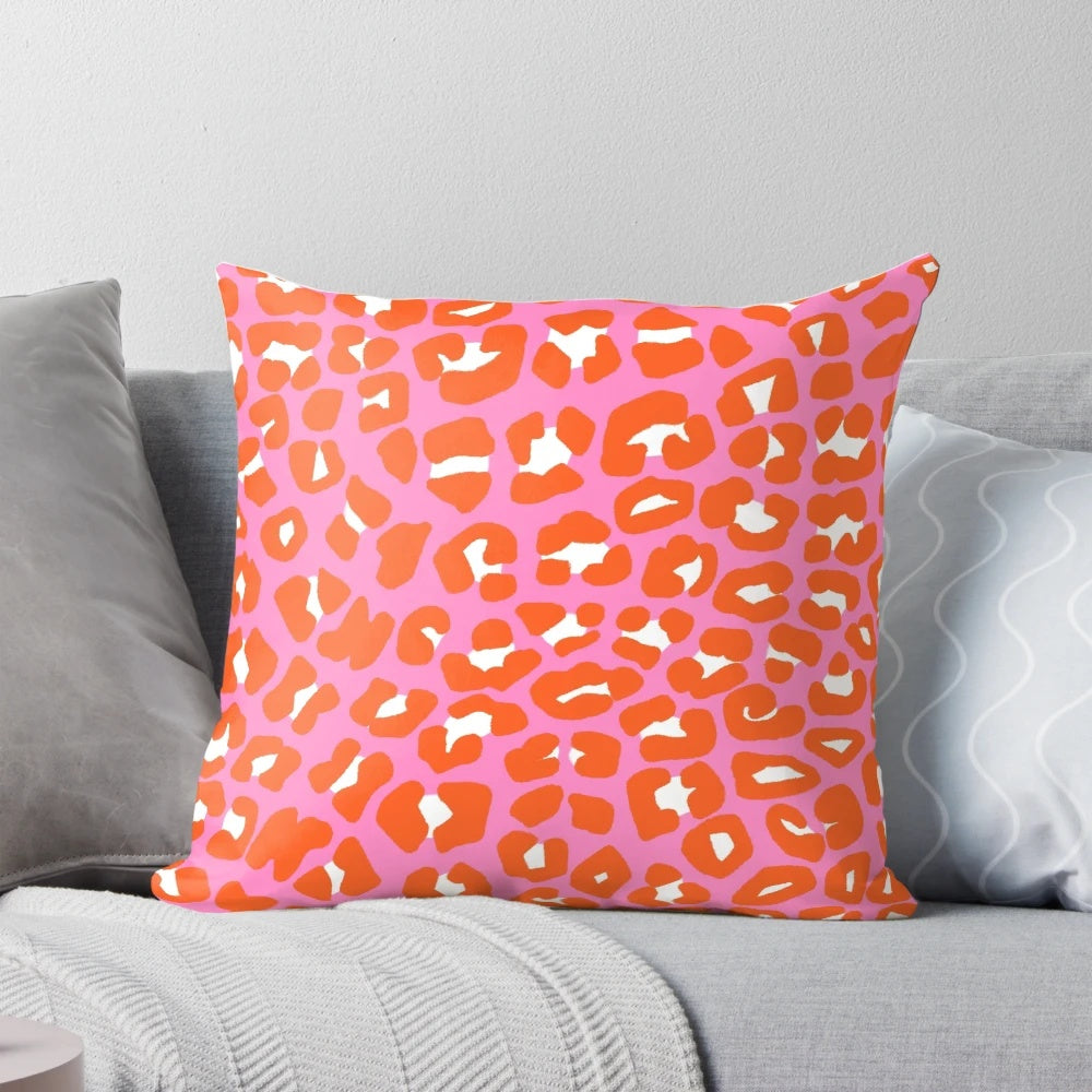 Plush pink and orange leopard print pattern pillow for home decor