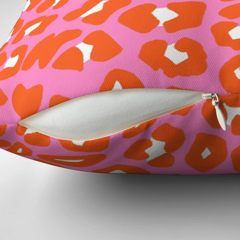 Plush pink and orange leopard print pattern pillow for home decor