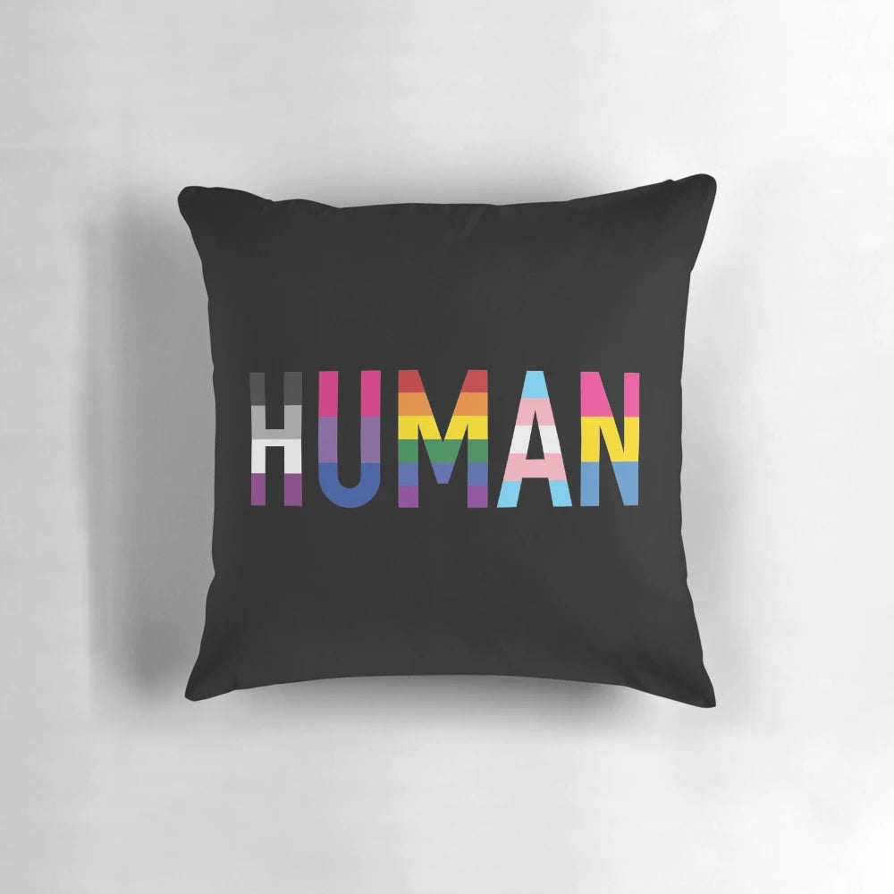 Colorful LGBTQIA+ pride flags printed on a plush, comfortable pillow.