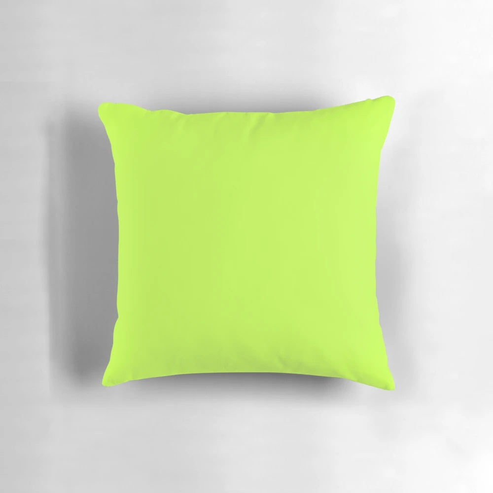 Lime green decorative pillow with a solid, minimalist design