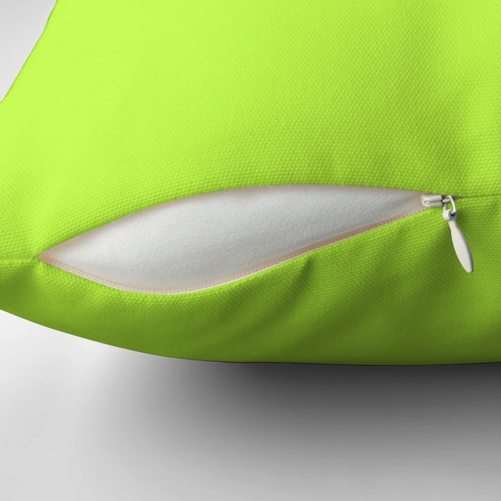 Lime green decorative pillow with a solid, minimalist design