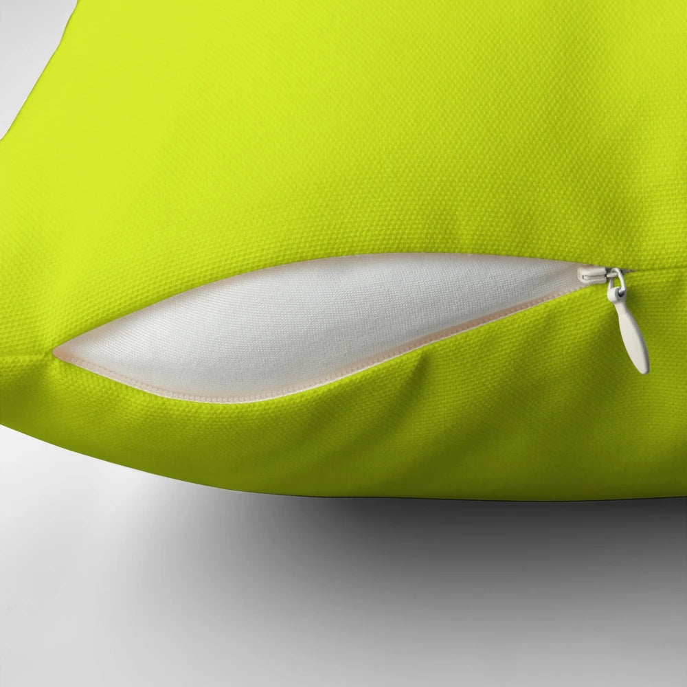 Lime green throw pillow in a solid color design