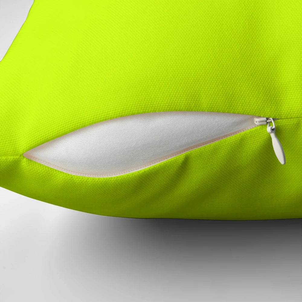 Bright green lime neon color accent pillow with abstract texture and modern graphic design