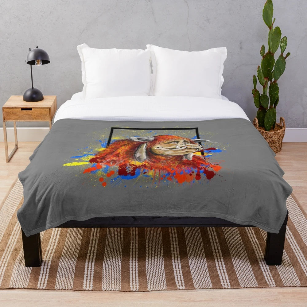 Colorful plush blanket featuring a ludo board game and fantasy creature design