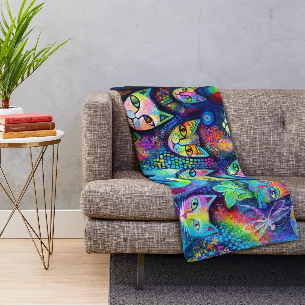 Colorful Magicats plush blanket featuring an abstract cat pattern