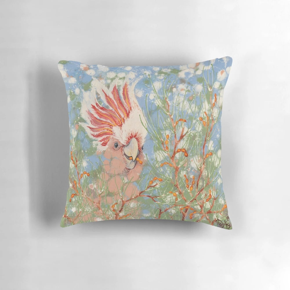Vibrant, colorful pillow featuring a detailed illustration of a Major Mitchell cockatoo, a striking Australian native bird.