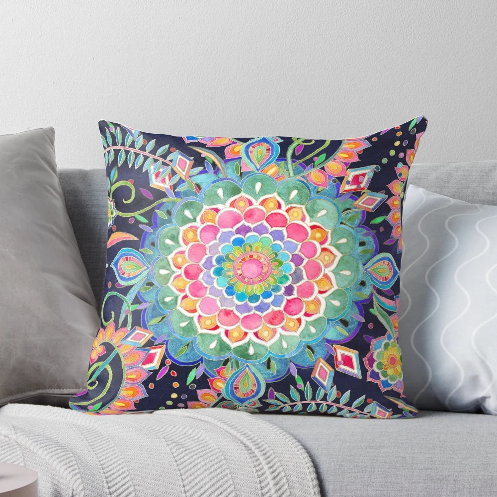 Vibrant, hand-drawn mandala design on a soft, decorative pillow