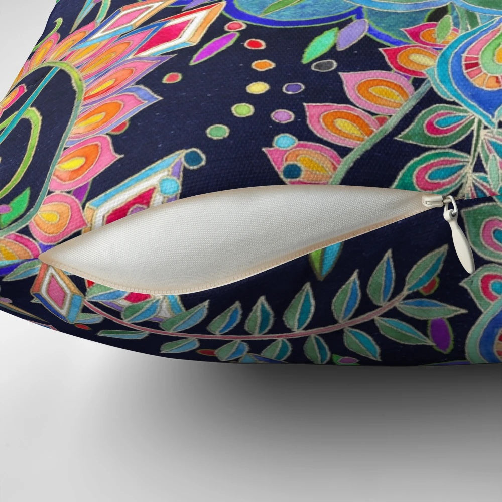 Vibrant, hand-drawn mandala design on a soft, decorative pillow