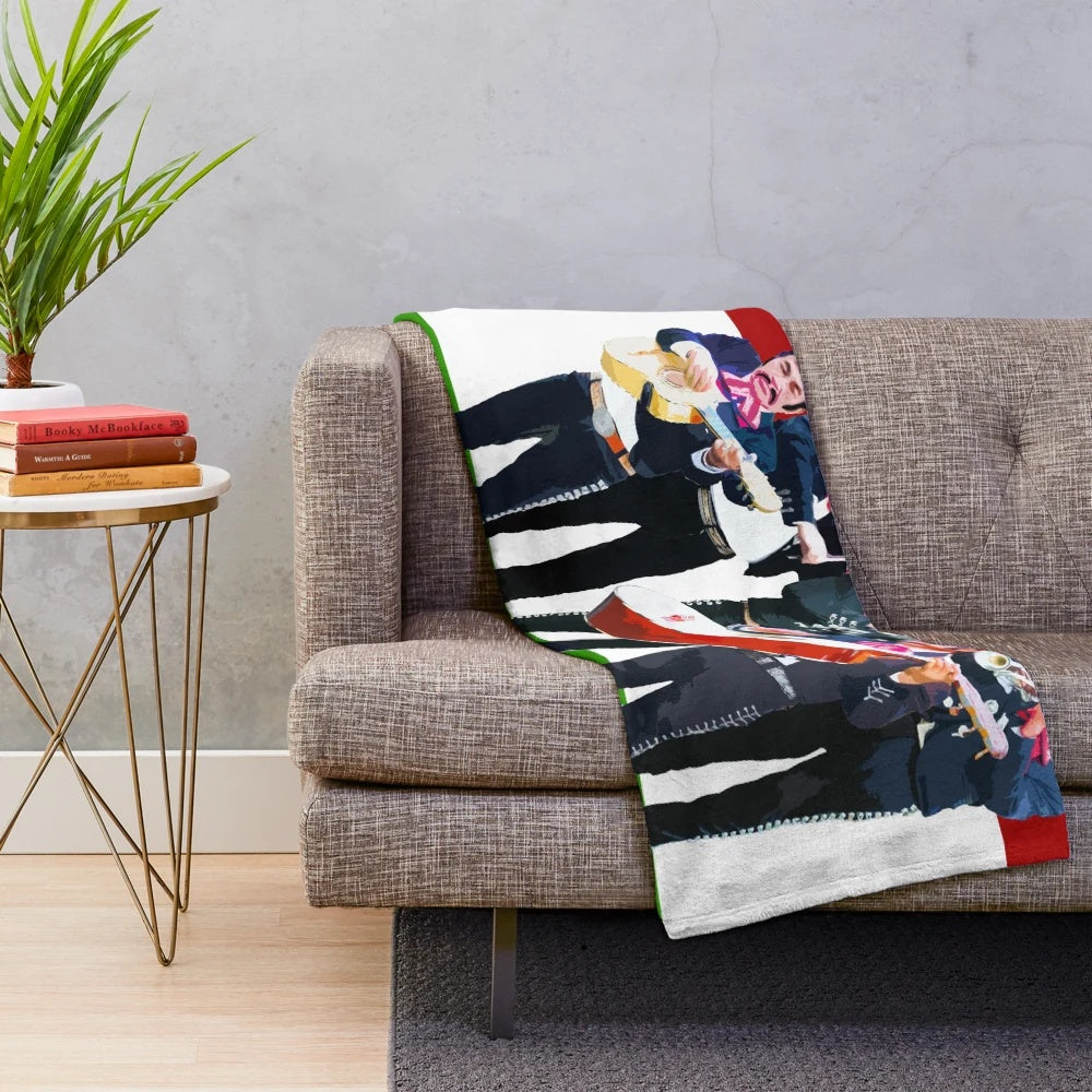 Colorful plush blanket featuring a mariachi band design