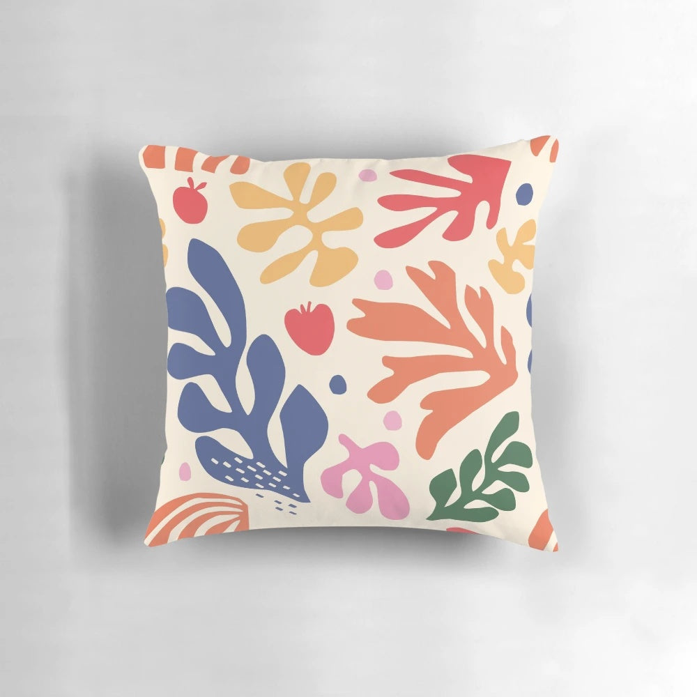 Decorative accent pillow featuring a vibrant floral design inspired by the Fauvist paintings of Henri Matisse