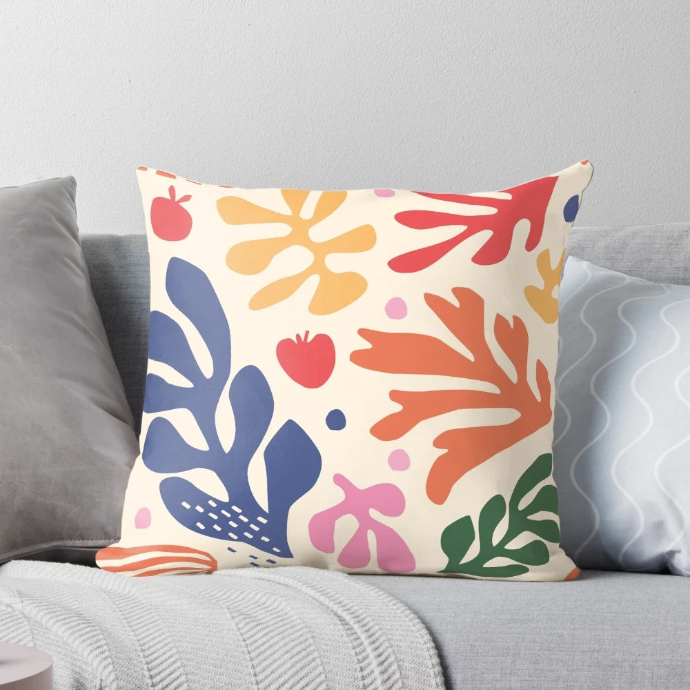 Decorative accent pillow featuring a vibrant floral design inspired by the Fauvist paintings of Henri Matisse