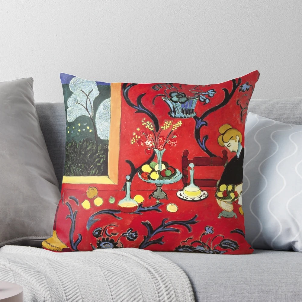 Decorative pillow featuring a design inspired by Matisse's The Red Room painting