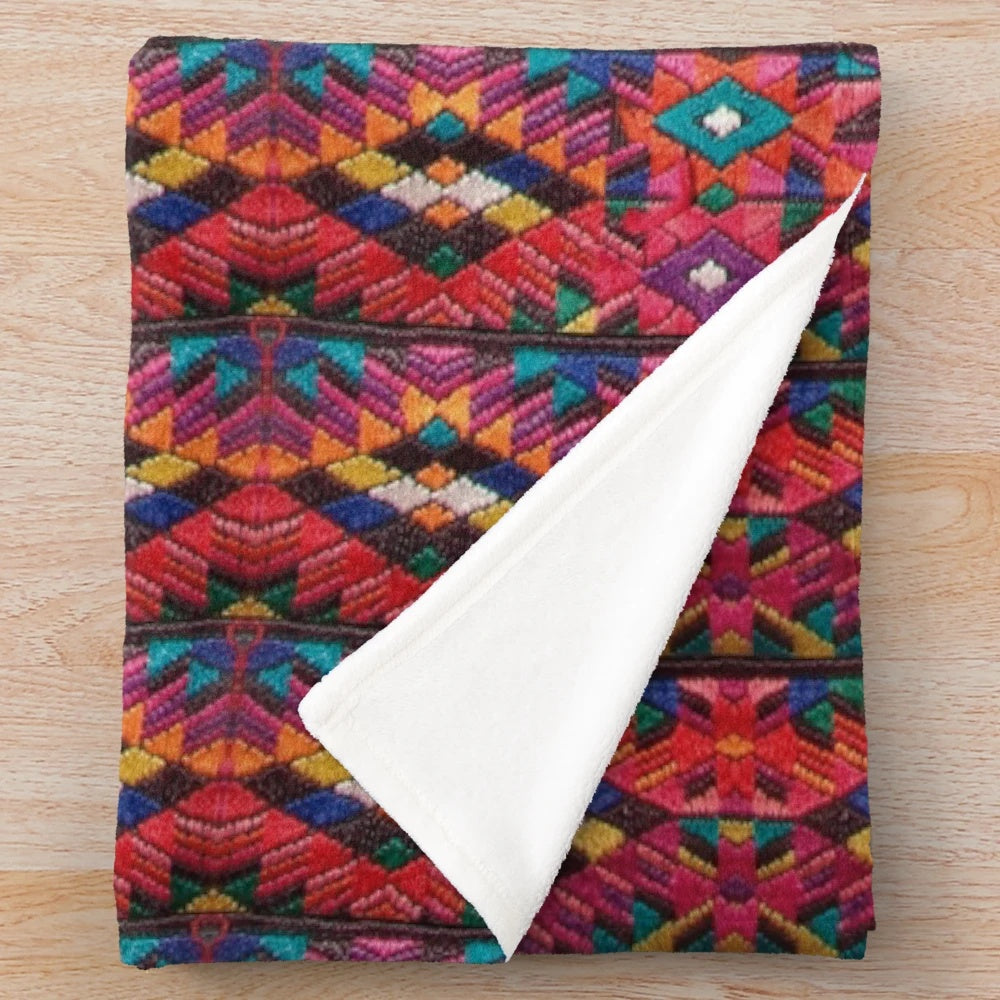 Vibrant Mayan kite inspired plush blanket with colorful katun mayan designs