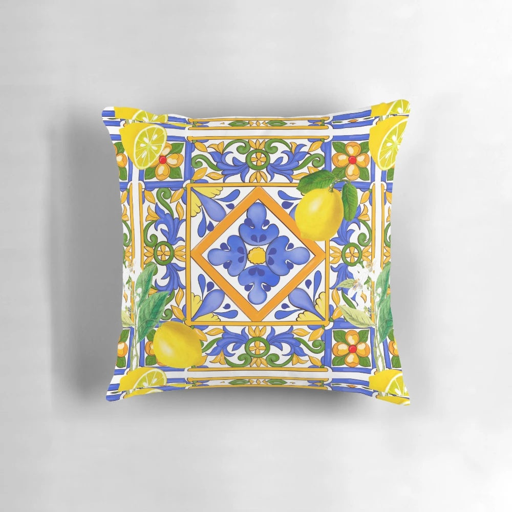 Colorful Mediterranean-inspired pillow featuring a Sicilian tile and citrus fruit pattern