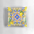Colorful Mediterranean-inspired pillow featuring a Sicilian tile and citrus fruit pattern