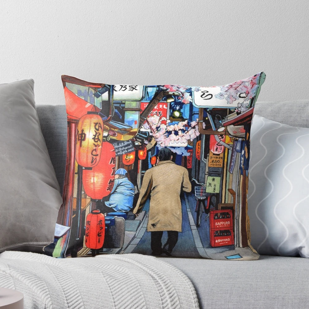A colorful pillow featuring a spring streetscape in Tokyo, Japan with cherry blossoms, neon signs, and an industrial urban atmosphere.