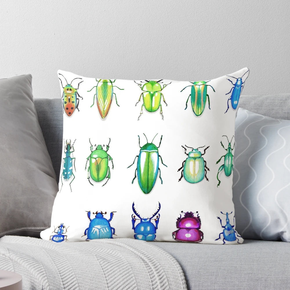 Colorful metallic beetles printed on a decorative throw pillow
