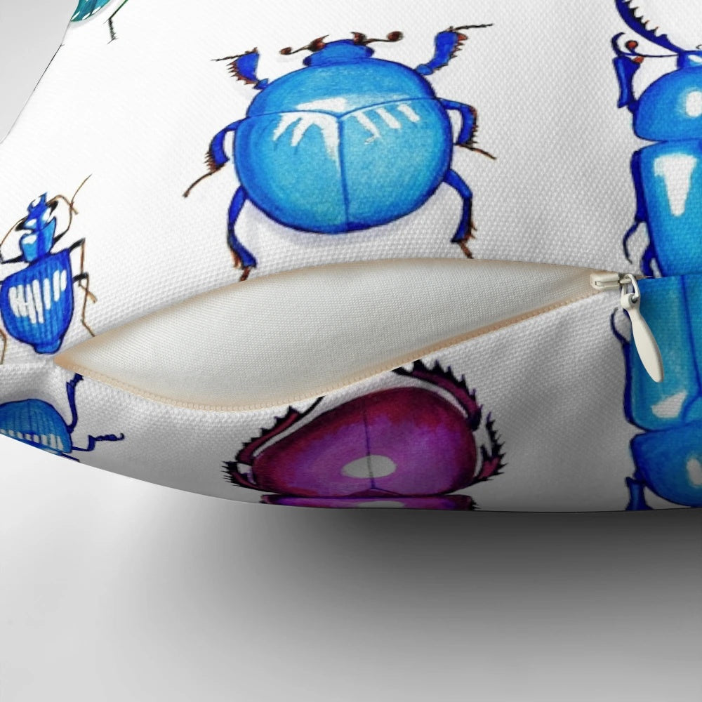 Colorful metallic beetles printed on a decorative throw pillow