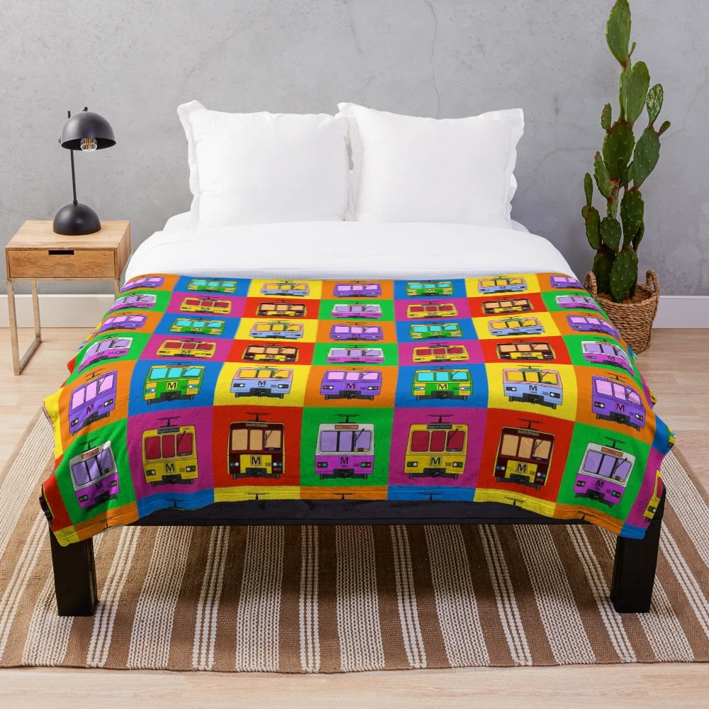 Colorful pop art design plush blanket inspired by the Tyne and Wear Metro system