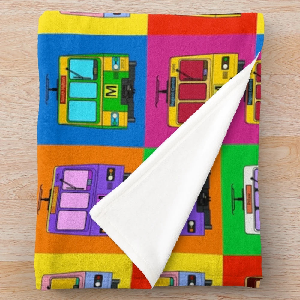 Colorful pop art design plush blanket inspired by the Tyne and Wear Metro system