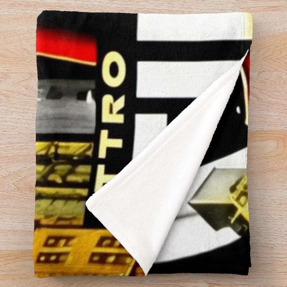 Plush blanket featuring a vibrant metropolis city and futuristic cinema inspired design
