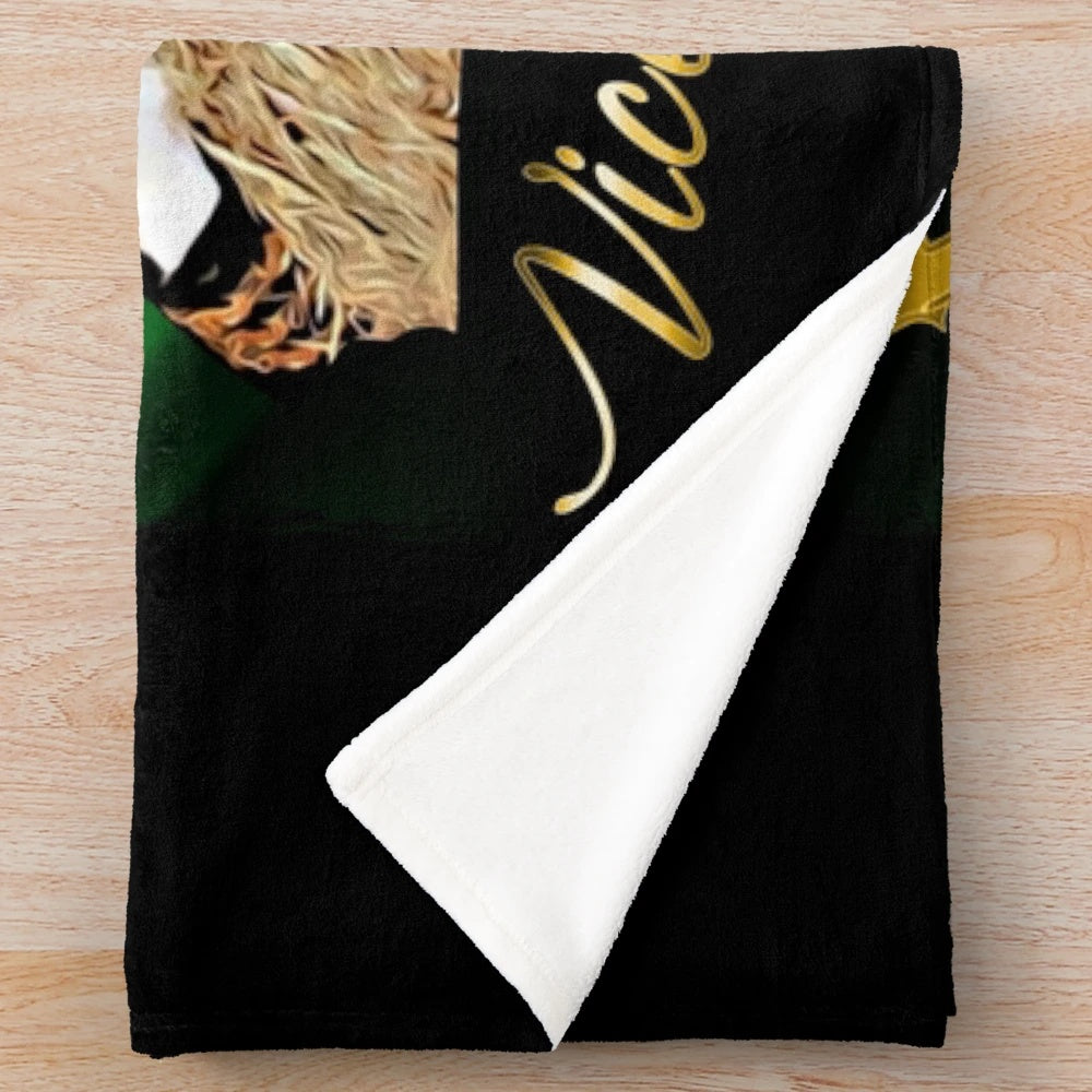 Colorful plush blanket featuring a portrait of a man in a traditional Mexican charro outfit