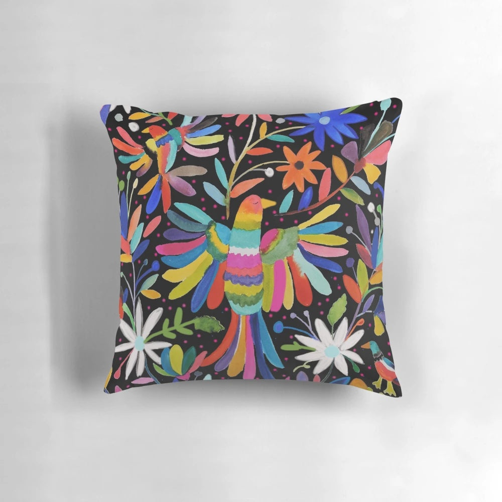 Colorful, handmade Mexican embroidered pillow with a unique, ethnic design.