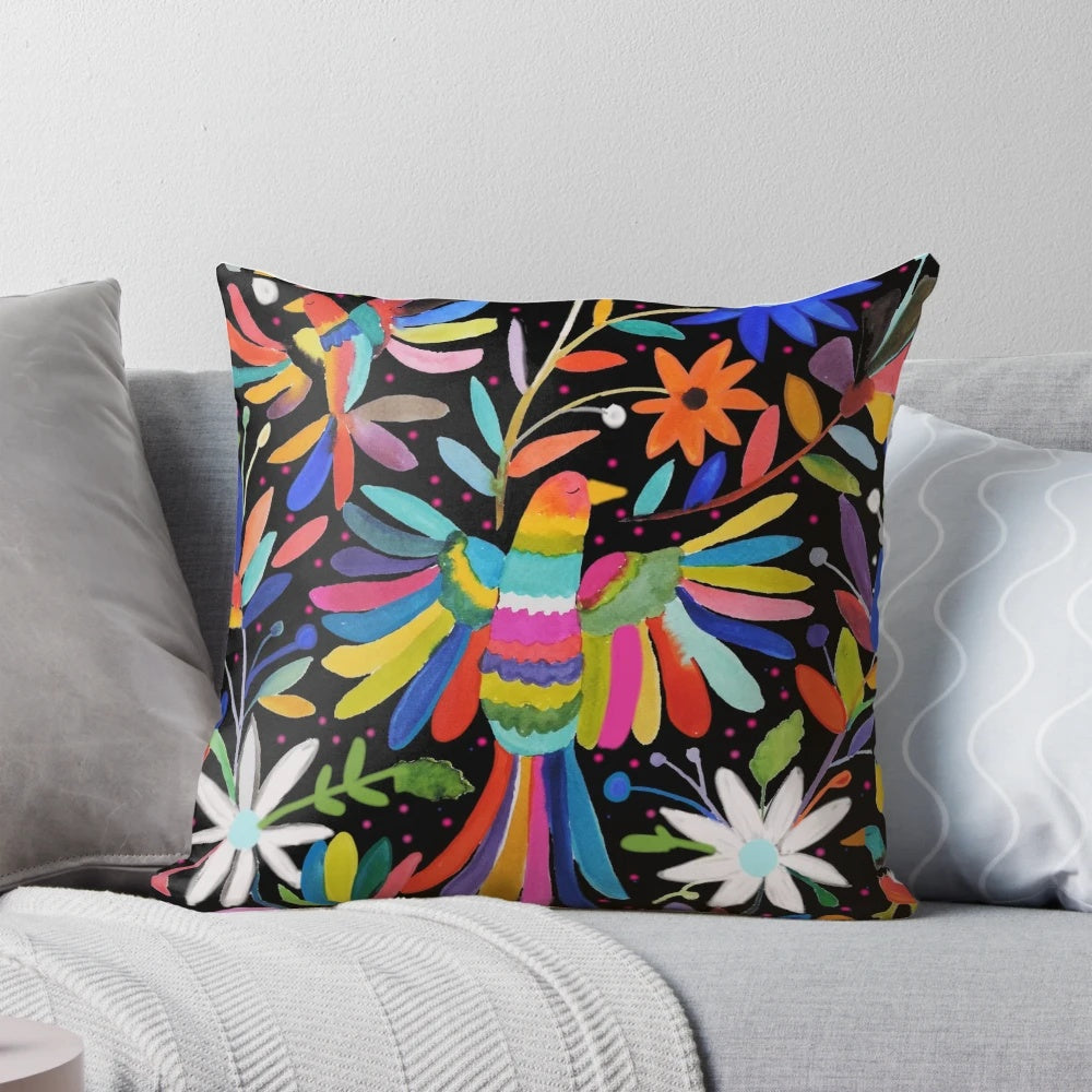 Colorful, handmade Mexican embroidered pillow with a unique, ethnic design.